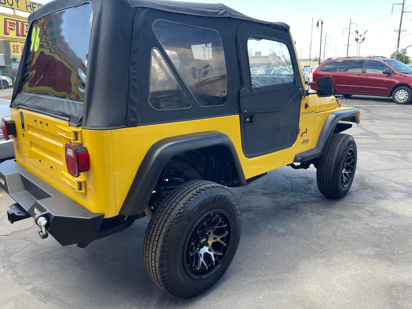 2000 Solar Yellow /Black Jeep Wrangler SE (1J4FA29P9YP) with an 2.5L 4 Cyl. engine, Manual transmission, located at 801 South State Street, Salt Lake City, UT, 84111, (801) 328-0098, 40.751953, -111.888206 - Wow extremely rare to find extra clean Jeep in immaculate condition 4x4! Low miles only 98,248 miles! Interior and exterior are both in excellent shape for the year. This is a clean title no reported accidents on the CarFax history report. It has passed emissions already and is ready to go. Featur - Photo#13